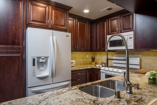 Sienna Bordeaux Granite Countertops Natural Stone Flat Panel Cabinets White Cabinets Gray Walls Natural Stone Options